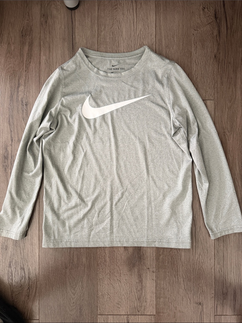 Nike Boy’s  Light Gray Long-Sleeve Dri Fit with White Swoosh. Size Medium